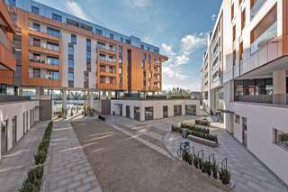 Апартаменты Riverside Apartments-Apartinfo Гданьск Апартаменты Делюкс с 2 спальнями и балконом, вид на реку (для 6 взрослых) - Stara Stocznia Street, 4-8