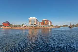 Апартаменты Riverside Apartments-Apartinfo Гданьск Апартаменты Делюкс с 2 спальнями и балконом, вид на реку (для 6 взрослых) - Stara Stocznia Street, 4-19