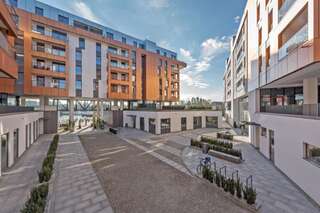 Апартаменты Riverside Apartments-Apartinfo Гданьск Апартаменты Делюкс с 2 спальнями и балконом, вид на реку (для 6 взрослых) - Stara Stocznia Street, 4-24